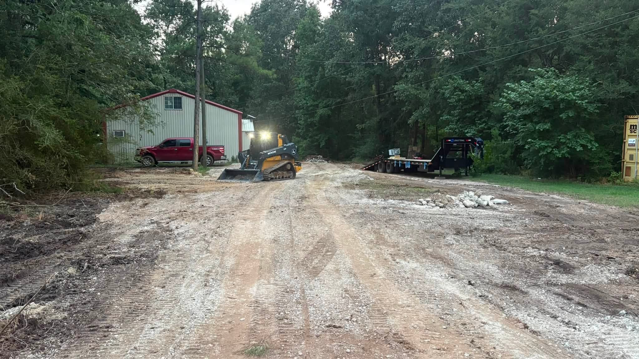 Graded gravel driveway site prep